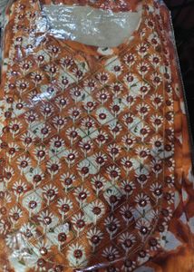 🆕 Naira Cut Orange Embroidered Kurti