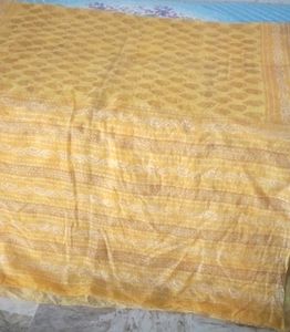 yellow printed saree attached fall