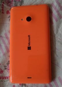 Microsoft Lumia 535, along with the charger