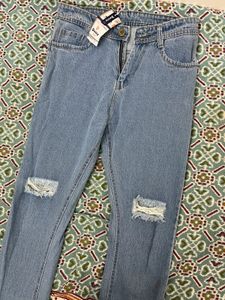 Women Ripped Knee Denim Jeans