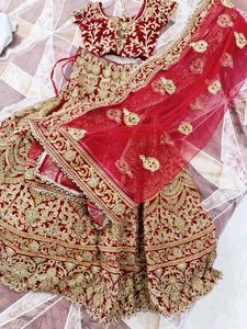Red Bridal Lehenga With Beautiful Golden Work