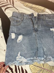 Ripped Light Washed Denim Skirt