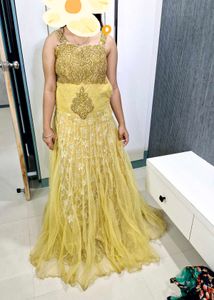 Golden Heavy Work Gown For Women.