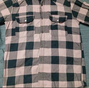 A Check Shirt With Black Or Peach Colour Combinati