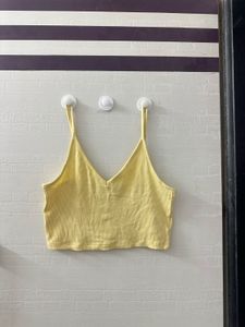 Cute yellow ribbed crop tank top.
