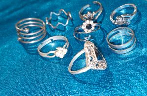 Assorted Gold Tone Earrings and Silver Rings