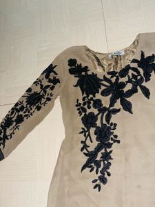 Elegant Beige Tunic with Black Embroidery