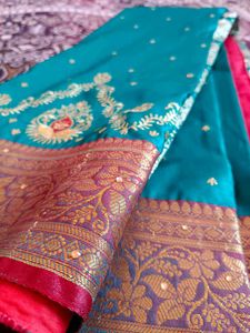 Elegant Teal & Gold Saree