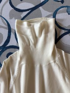 Cream Turtleneck Sweater