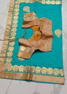 Teal Saree with Gold Embellishments