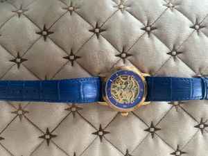 Gold and Blue Skeleton AP Style Watch