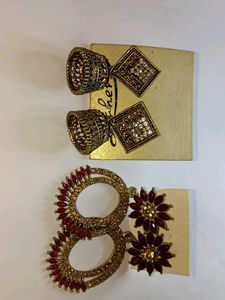 2 sets of ethnic earrings with golden detailing