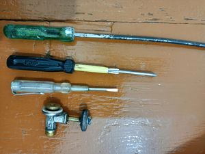 3 Different Size Screwdrivers And Joint