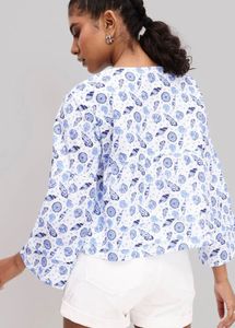 white top with blue botanical prints