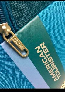 American tourister duffel bag with wheels