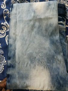 Distressed Blue Denim Jeans