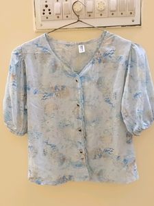 Light Blue Shirt.