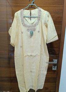 Beautiull cream kurti with neck work