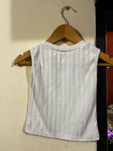 denim skir, white ribbed t shirt and  jac