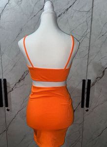Urbanic Neon Orange Backless Cutout Body Corn Dres