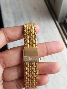 Titan Gold Tonned Oval Shaped Unisex  Watch