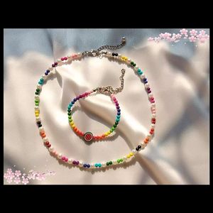 Rainbow necklace and bracelet &amp; earrings.