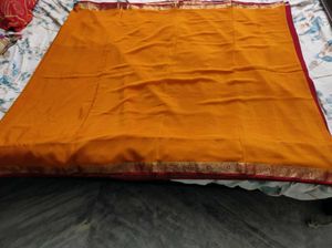 Mustard Yellow And Maroon Pure Crepe Silk Saree