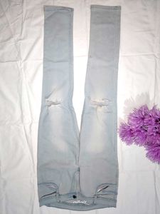 Ripped Knee Jeans