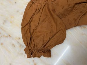 brown crop top with puffy sleeves