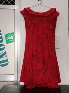 This is a  Red Dress With Unique Pattern Designs