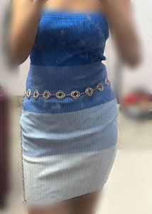 Dress with waist chain and earring