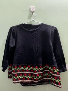 Embroidered Floral Hem Top