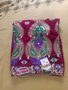 Elegant Maroon Embroidered Saree