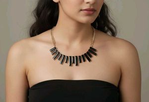 Black and gold neck piece