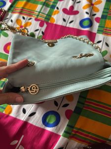 Lino Perros Quilted Sling Bag