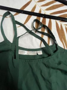 A Cute Yet sassy Crisscross Neck Top