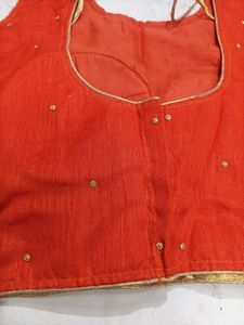 Orange Colour Blouse With Sleeves Inside...