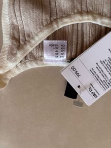 Incut Tank Top with Price Tag