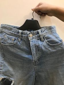 Ripped Light Wash Denim Jeans