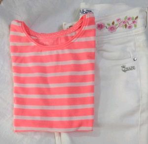 A Super Cool White Jean&#39;s With Neon Orange Top