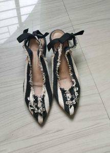 Striped  sling back ribbon heel.