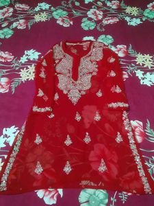 Red Lucknowi kurta set with inner tape