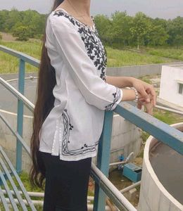 Elegant White Embroidered kurti