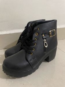 Black leather boots