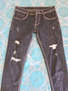 Distressed Denim Jeans