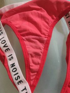 Red &#34;Love is Noise&#34; Thong