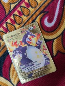 Charizard Vmax Gold Pokemon Card.