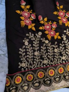 Yellow and brown new saree with intact blouse piec
