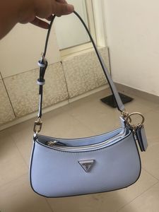 GUESS Women Solid Half Moon Fringed Shoulder bag