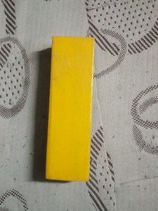 Yellow Wooden Block. Black board duster